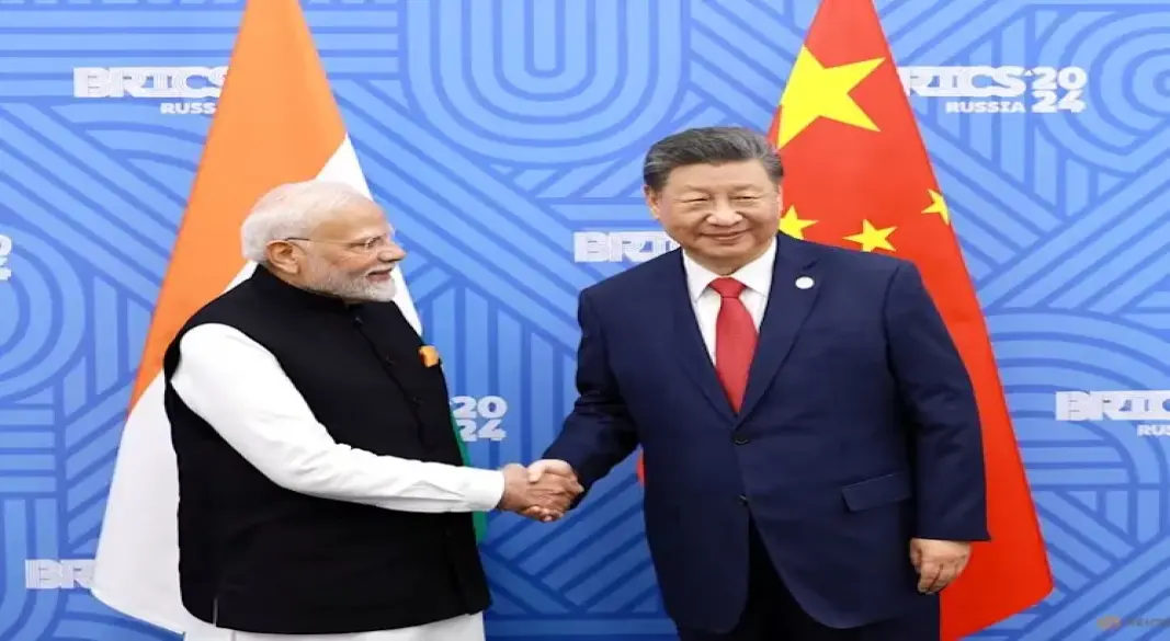 ব্রিকস সম্মেলনে দ্বিপাক্ষিক বৈঠকে অংশ নিয়ে করমর্দন করছেন ভারতের প্রধানমন্ত্রী নরেন্দ্র মোদি ও চীনের প্রেসিডেন্ট শি জিনপিং। ছবি: সংগৃহীত